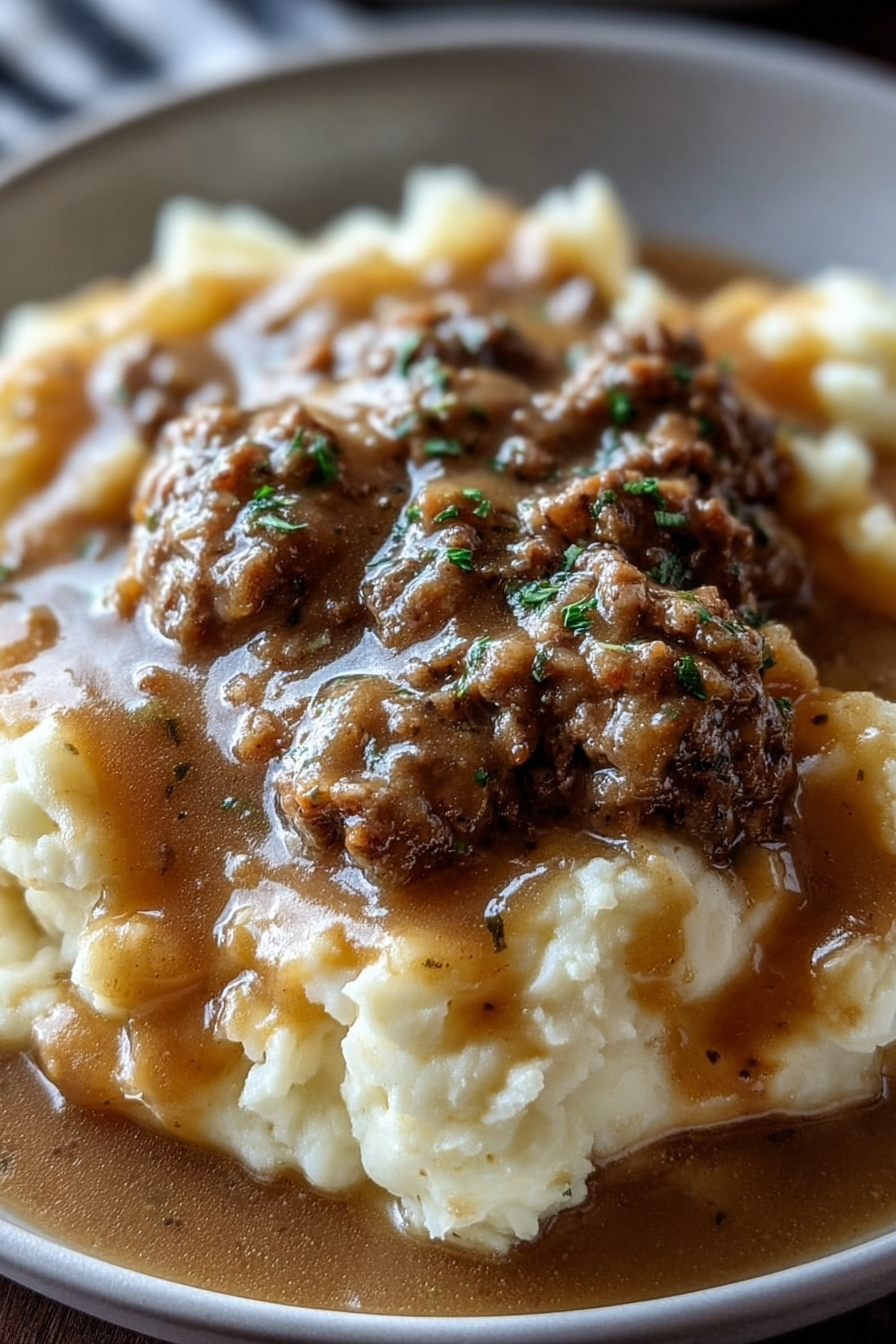 Delicious chicken hamburger gravy over mashed potatoes image 2